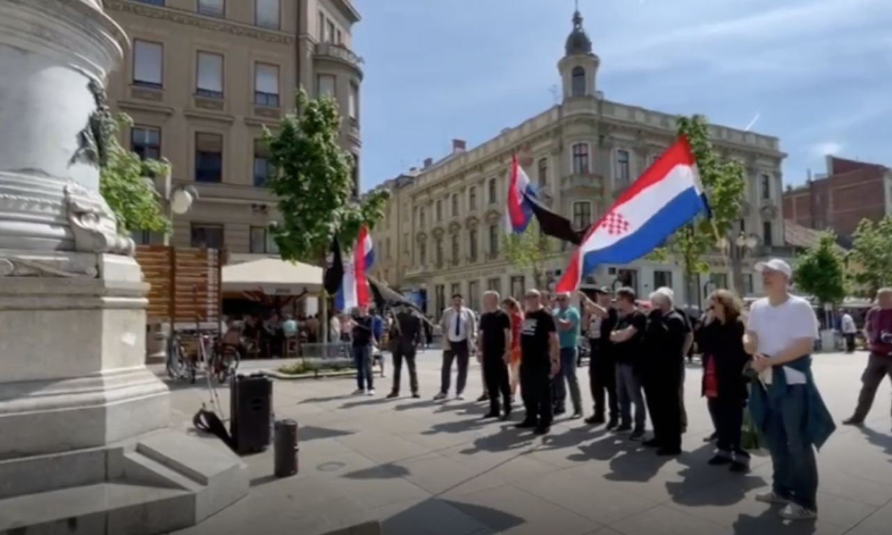 HAOS ISPRED SVETINJE U ZAGREBU! Stoje pred PRAVOSLAVNOM CRKVOM, mašu CRNIM ZASTAVAMA i pevaju Tompsonove pesme (VIDEO)