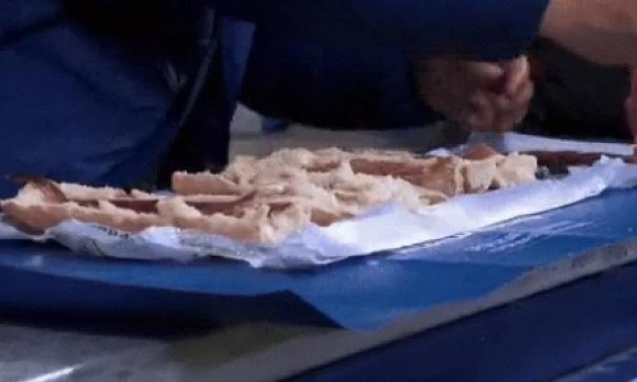 NESTVARNA SCENA U LIGI ŠAMPIONA Navijač Atletiko Madrida pravio sendviče na tribini! (VIDEO)